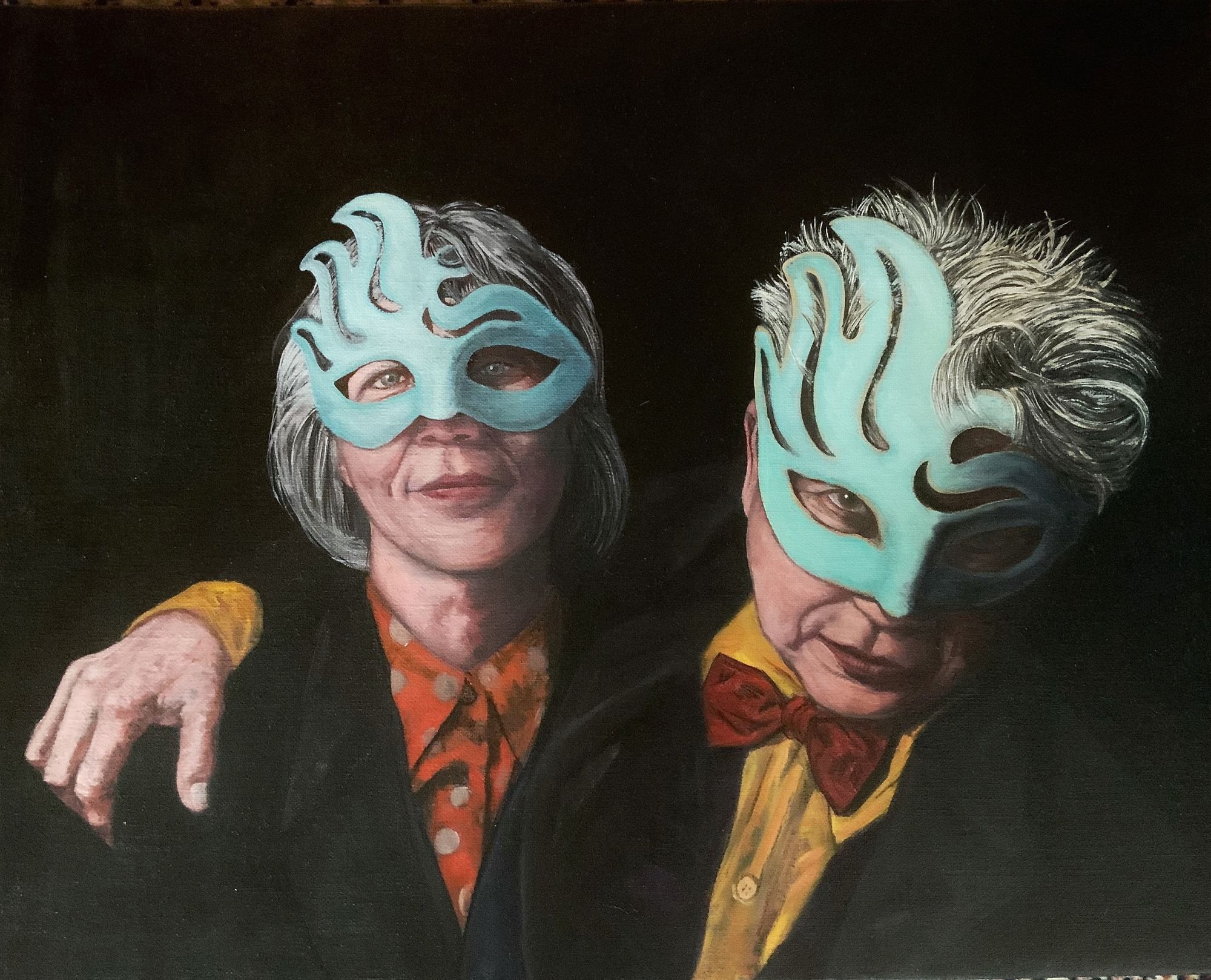 Oil on linen portrait of two people wearing matching turquoise flame-shaped masquerade masks, one in a polka-dot orange shirt and dark jacket, the other in a yellow shirt with a red bow tie, against a dark background.