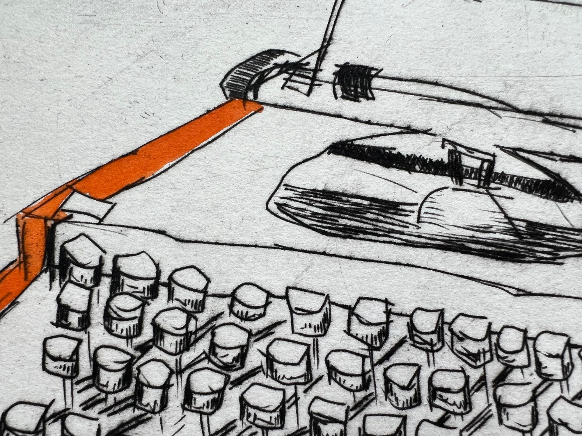 Close-up detail of the Olympus typewriter drypoint print, focusing on the round typewriter keys and platen area with bold black drypoint lines and an orange watercolor accent along the left edge of the typewriter body.