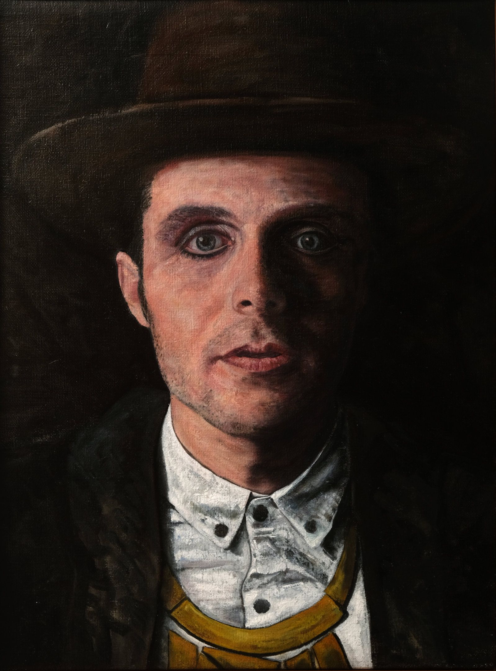 Oil portrait of a young man wearing a dark hat and coat over a white button-up shirt with a gold scarf, his face dramatically lit from the left with deep shadows on the right, gazing directly at the viewer against a dark background.