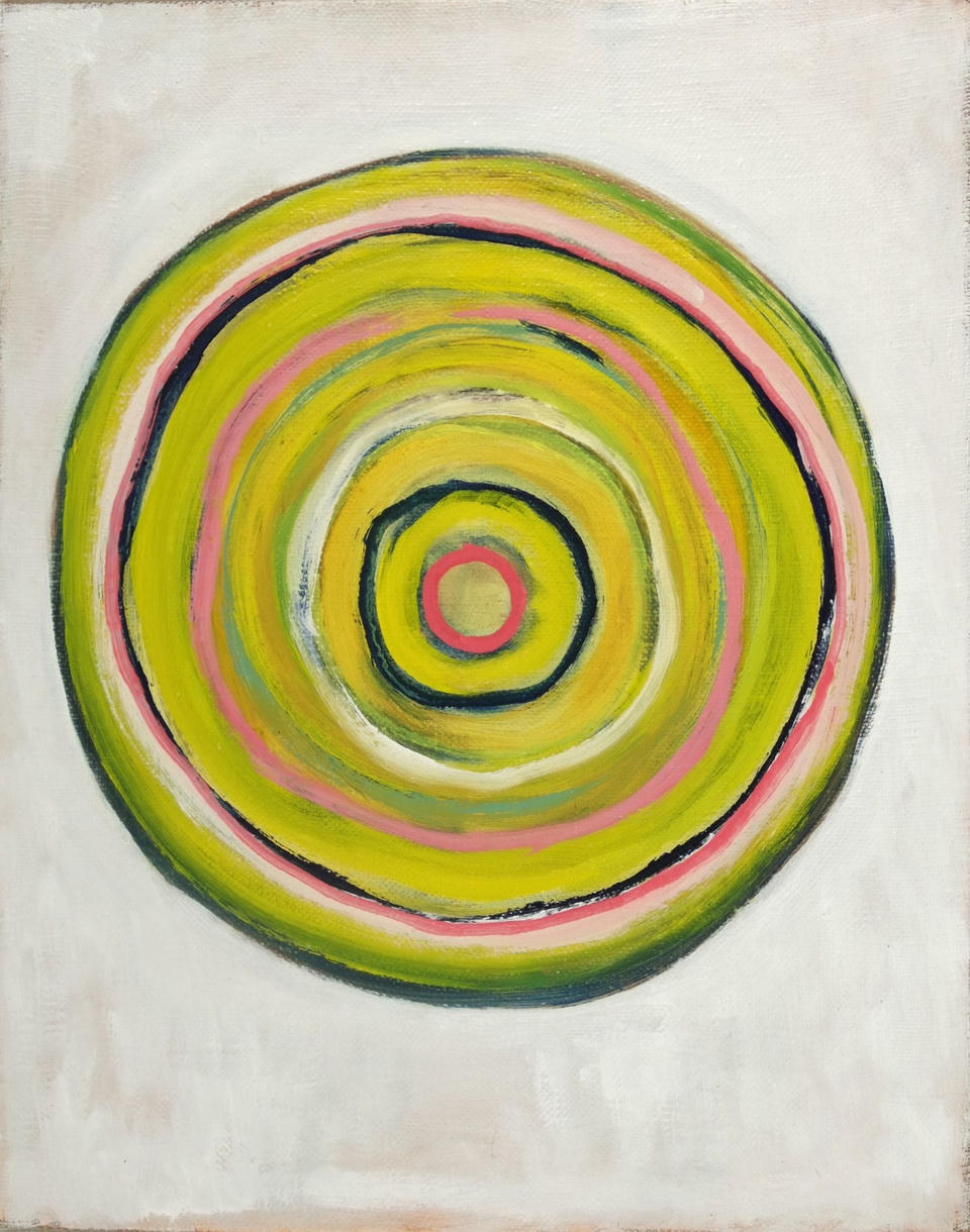 Oil painting of concentric circles in chartreuse, pink, and dark green bands with a small red-pink dot at center, on a white linen ground.