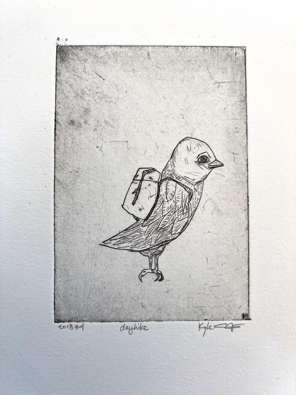 Alternate print of the backpacking bird, showing slightly darker ink coverage and tonal variation in the plate marks surrounding the small detailed figure.