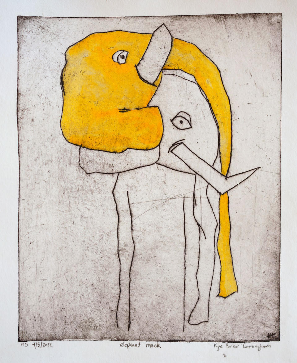 Hand-colored intaglio print of a standing figure wearing a large yellow elephant mask with a curving trunk, rendered in black line work with bold golden-yellow watercolor on a textured off-white ground.