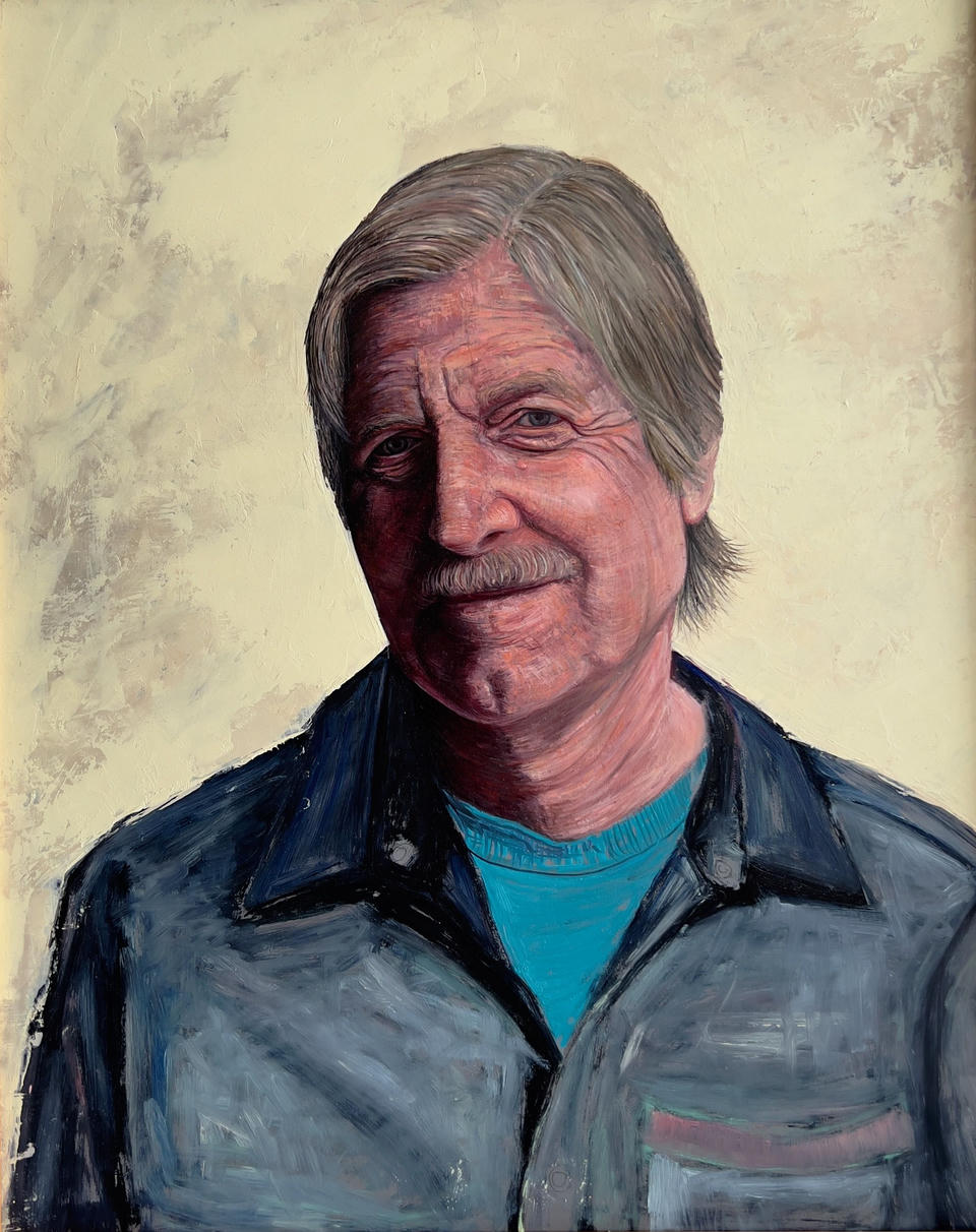 Oil portrait of an older man with gray hair and a mustache, wearing a blue jacket over a turquoise shirt, rendered with visible impasto brushwork against a warm cream background.