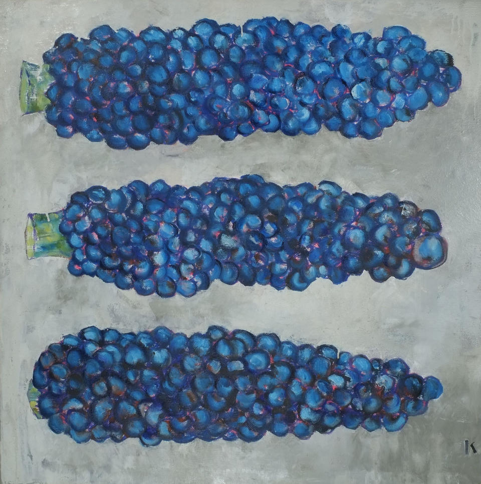 Oil painting of three ears of blue corn arranged horizontally in rows against a pale gray background, with vivid blue and purple kernels and small green husks.